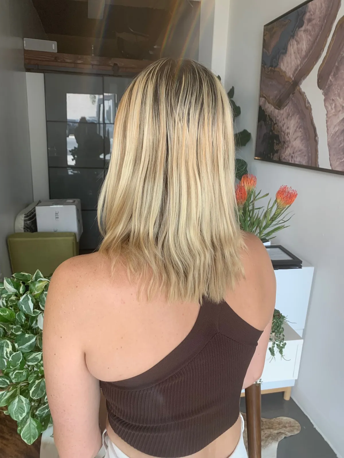 Before: a shoulder length blonde lob with darker roots.