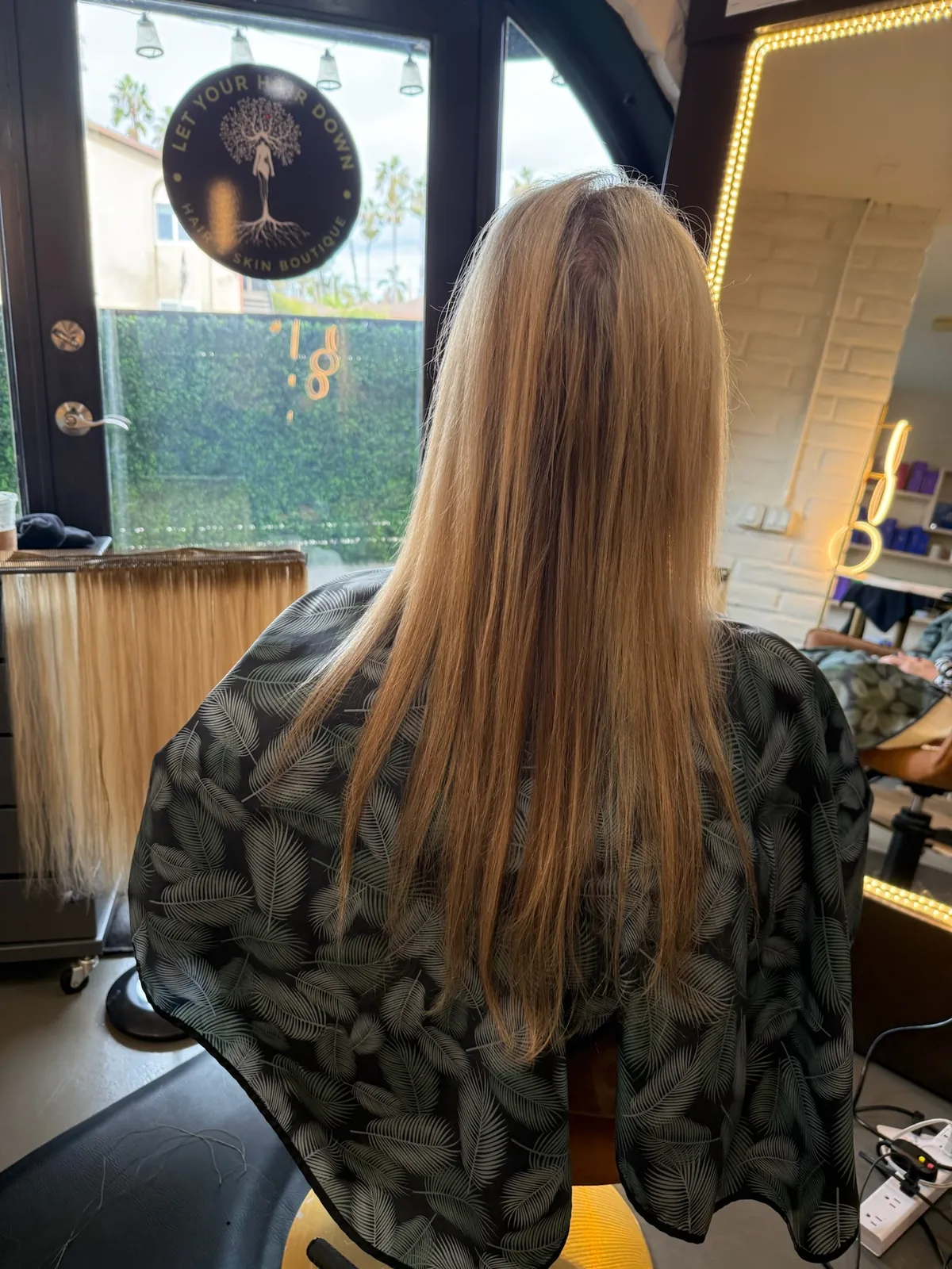 Before: long straight blonde hair thinning toward the ends.